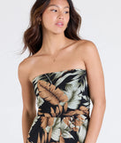 Pair the Tropical Breeze Strapless Wide-Leg Jumpsuit with your favorite sandals or sneakers for effortless warm-weather looks with on-trend black jumpsuits that speak your style.