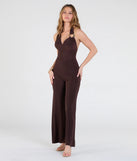 Create bold, fashion-forward looks for spring or summer with the Dinner At Sunset Open Back Wide-Leg Jumpsuit in brown, a must-have piece from Windsor’s collection of stylish bottoms for women.