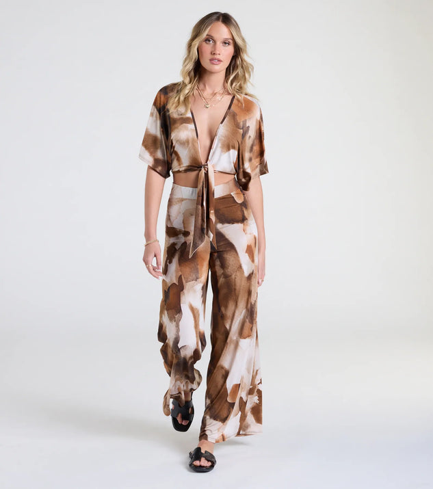 Pair the  Off To Paradise Wide-Leg Abstract Pants with your favorite crop or bodysuit for effortless warm-weather looks with on-trend brown pants that speak your style.