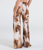 Pair the  Off To Paradise Wide-Leg Abstract Pants with your favorite crop or bodysuit for effortless warm-weather looks with on-trend brown pants that speak your style.