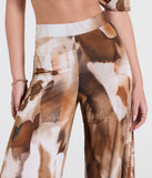 Pair the  Off To Paradise Wide-Leg Abstract Pants with your favorite crop or bodysuit for effortless warm-weather looks with on-trend brown pants that speak your style.