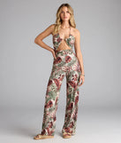 Choosing a taupe jumpsuit like the Vacay Mood Tropical Print Halter Cutout Jumpsuit means you’re ready for anything—no outfit planning needed, just style, go, and glow.