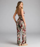 Choosing a taupe jumpsuit like the Vacay Mood Tropical Print Halter Cutout Jumpsuit means you’re ready for anything—no outfit planning needed, just style, go, and glow.
