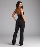Step out in the Sultry Heat Cowl Halter Cutout Jumpsuit, a black jumpsuit made to elevate your vibe from brunch to after-dark plans with ease and polish.
