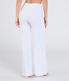 Create bold, fashion-forward looks for spring or summer with the On The Go High-Rise Crepe Trouser Pants in ivory, a must-have piece from Windsor’s collection of stylish bottoms for women.