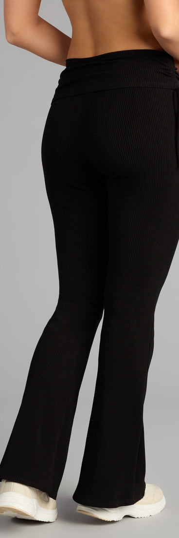 Make a fall statement in e2d25516-c238-4a17-9bbf tones that highlight the Lounge Goals Rib Knit Flare Pants as a must-have among fall bottoms for women.