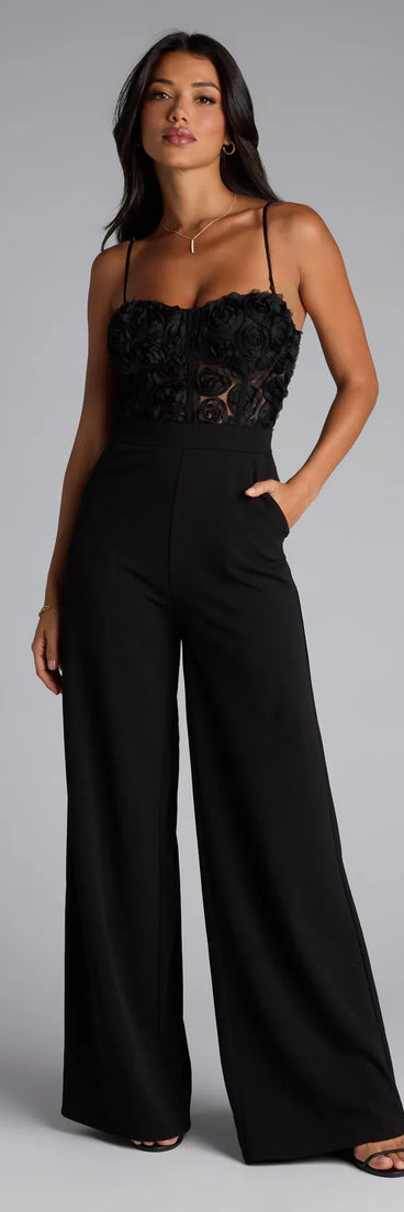Elevate your look with the Bare Necessities Floral Applique Corset Jumpsuit, a chic black jumpsuit that delivers effortless polish for dinners, events, or date nights.