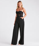 Create bold, fashion-forward looks for spring or summer with the Bare Necessities Floral Applique Corset Jumpsuit in black, a must-have piece from Windsor’s collection of stylish bottoms for women.