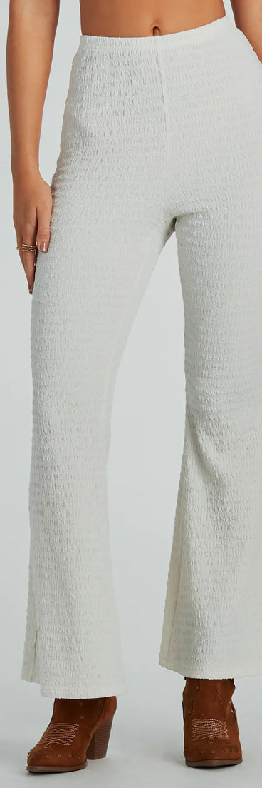 The So Boho High Waist Crinkle Knit Flare Pants in natural is a pair of women's pants with an on-trend leg style and elevated fabric that adds texture, perfect for crafting effortless winter outfits.