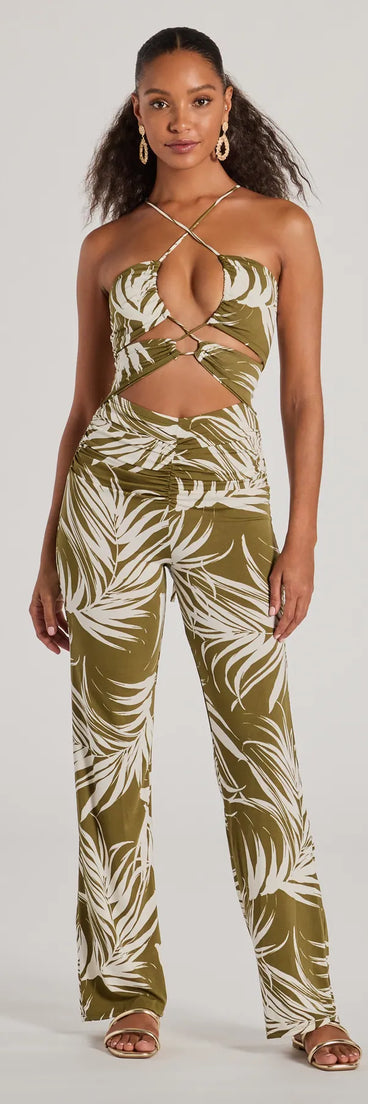 The Jet-Set to Paradise Strappy Cutout Tropical Knit Jumpsuit in olive is a women's jumpsuit with an on-trend leg style and elevated fabric that adds texture, perfect for crafting effortless winter outfits.