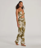 Step into seasonal style with the Jet-Set to Paradise Strappy Cutout Tropical Knit Jumpsuit, a pair of women's olive pants in a rich winter color, ideal for creating chic holiday party attire or a night-out look.