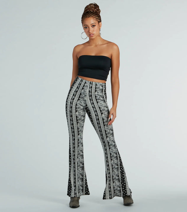 The Free Spirit Chick High-Rise Boho Flare Pants in black is a pair of women's pants with an on-trend leg style and elevated fabric that adds texture, perfect for crafting effortless winter outfits.