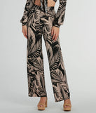 The Tropical Day Dream High-Rise Wide Leg Pants in black is a versatile pair of women's pants with trendy design accents, crafted for celebration-ready looks, from office wear to sophisticated winter night outs.