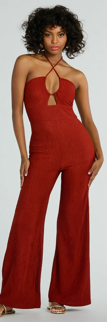 The Sunny Energy Halter Cut Out Wide Leg Jumpsuit, a women's rust jumpsuit, is a chic one-piece outfit for parties and celebrations offering a glamorous look with festive style and on-trend design accents.