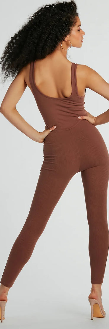 The Chill Vibes Ribbed Knit Corset Catsuit in coffee brown is a versatile pair of women's pants with trendy design accents, crafted for holiday-ready looks, from office wear to sophisticated winter night outs.