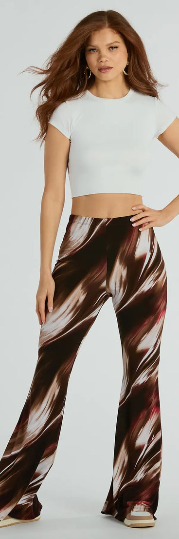 The Brush Stroke High-Rise Flare Pants in brown is a pair of women's pants with an on-trend leg style and elevated fabric that adds texture, perfect for crafting effortless winter outfits.