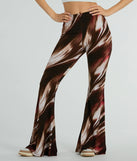 The Brush Stroke High-Rise Flare Pants in brown is a versatile pair of women's pants with trendy design accents, crafted for holiday-ready looks, from office wear to sophisticated winter night outs.