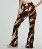Step into seasonal style with the Brush Stroke High-Rise Flare Pants, a pair of women's brown pants in a rich winter color, ideal for creating chic holiday party attire or a night-out look.