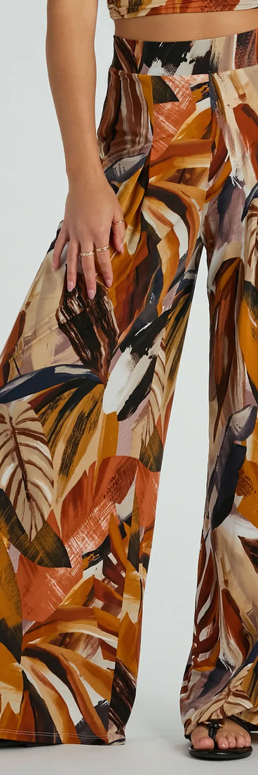 The Vacay Ready Tropical Knit Wide-Leg Pants in cognac is a versatile pair of women's pants with trendy design accents, crafted for holiday-ready looks, from office wear to sophisticated winter night outs.