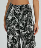 Step into seasonal style with the Time For Vacay High Rise Tropical Palazzo Pants, a pair of women's black pants in a rich winter color, ideal for creating chic holiday party attire or a night-out look.