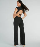 The Tie Me Right Cutout Open Back Flare Jumpsuit in black is a versatile women's jumpsuit with trendy design accents, crafted for holiday-ready looks, from office wear to sophisticated winter night outs.