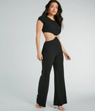 Step into seasonal style with the Tie Me Right Cutout Open Back Flare Jumpsuit, a pair of women's black pants in a rich winter color, ideal for creating chic holiday party attire or a night-out look.