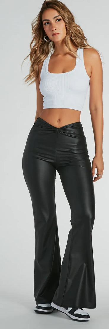 The Fierce Edge Mid-Rise Flare Faux Leather Pants in black is a pair of women's pants with an on-trend leg style and elevated fabric that adds texture, perfect for crafting effortless winter outfits.