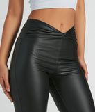 Step into seasonal style with the Fierce Edge Mid-Rise Flare Faux Leather Pants, a pair of women's black pants in a rich winter color, ideal for creating chic holiday party attire or a night-out look.