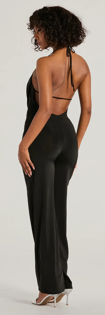 The Impressive Momemt Cowl Neck Strappy Wide-Leg Jumpsuit in black is a versatile women's jumpsuit with trendy design accents, crafted for holiday-ready looks, from office wear to sophisticated winter night outs.