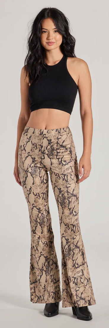 The Slither In Style High Rise Snake Print Flare Pants in taupe is a pair of women's pants with an on-trend leg style and elevated fabric that adds texture, perfect for crafting effortless winter outfits.