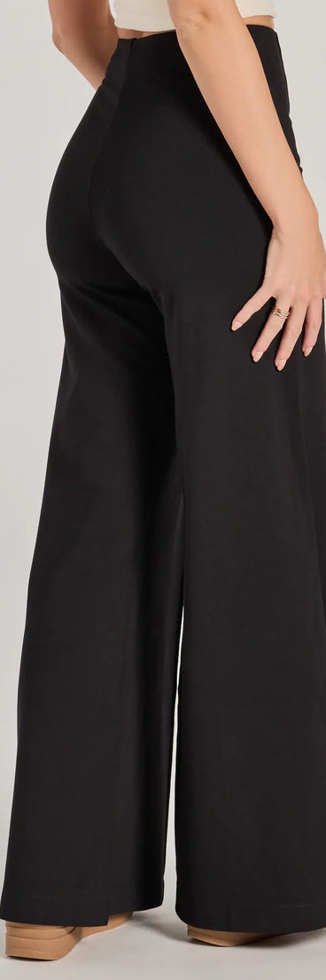 The Classic And Chic Wide-Leg Trouser Pants is a trendy women's bottom in black, designed with modern details and alluring textures to complete chic outfits for 2025.