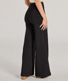 The Classic And Chic Wide-Leg Trouser Pants is a trendy women's bottom in black, designed with modern details and alluring textures to complete chic outfits for 2025.