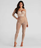 The Iridescent Sparkle Rhinestone-Embellished Sheer Catsuit in natural is a sleek women's catsuit featuring a chic, body-hugging silhouette with on-trend details for a striking profile, perfect for creating winter going-out looks or holiday party outfits.