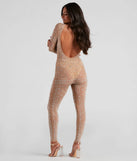 The Iridescent Sparkle Rhinestone-Embellished Sheer Catsuit in natural is a sleek women's catsuit featuring a chic, body-hugging silhouette with on-trend details for a striking profile, perfect for creating winter going-out looks or holiday party outfits.
