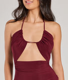 Create bold, fashion-forward looks for spring or summer with the Enticing Sass Halter Cutout Wide-Leg Jumpsuit in plum, a must-have piece from Windsor’s collection of stylish bottoms for women.