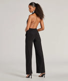 The Chic Position Plunge Scarf Straight-Leg Jumpsuit is a trendy women's bottom in black, designed with modern details and alluring textures to complete chic outfits for 2025.