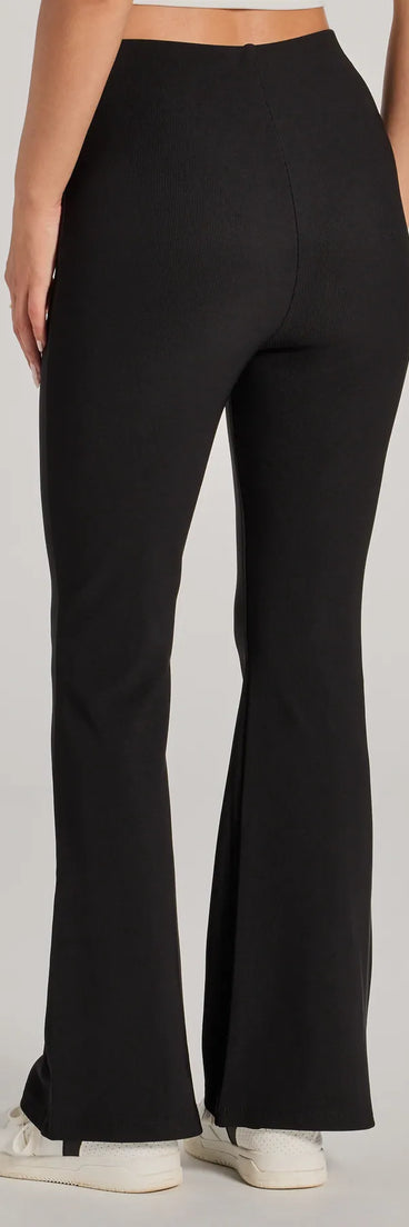 The Laidback Look Ribbed Knit Flare Pants is a trendy women's bottom in black, designed with modern details and alluring textures to complete chic outfits for 2025.
