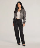 The Sleek Impression Belted Straight-Leg Trouser Pants is a trendy women's bottom in black, designed with modern details and alluring textures to complete chic outfits for 2025.