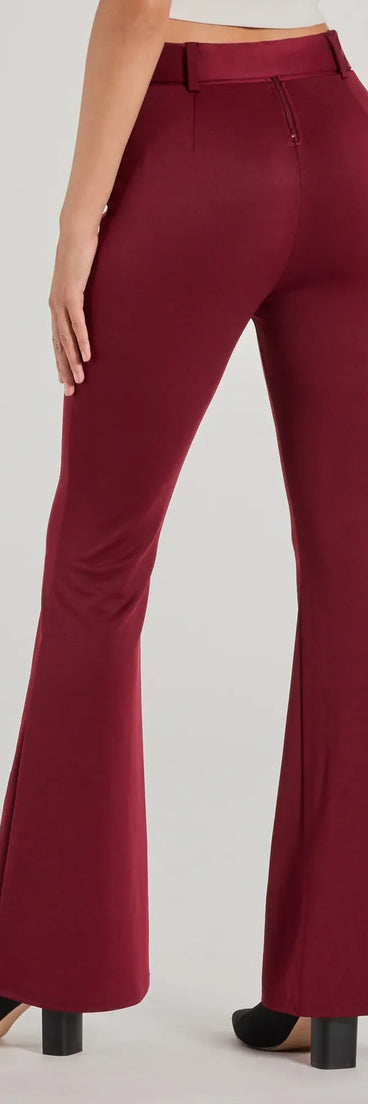 The Polished Glam Belted Wide Leg Pants is a trendy women's bottom in burgundy, designed with modern details and alluring textures to complete chic outfits for 2025.