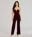 The The Glam Factor Sleeveless Velvet Jumpsuit is a trendy women's bottom in wine, designed with modern details and alluring textures to complete chic outfits for 2025.