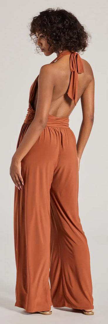 The Raise The Bar Wide-Leg Jumpsuit is a trendy women's bottom in rust, designed with modern details and alluring textures to complete chic outfits for 2025.