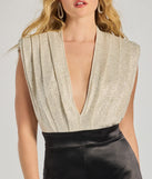 Create bold, fashion-forward looks for spring or summer with the Radiant Era Glitter Lurex And Satin Jumpsuit in black, a must-have piece from Windsor’s collection of stylish bottoms for women.
