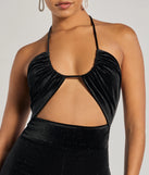 Create bold, fashion-forward looks for summer with the Here To Party Glitter Knit Cutout Jumpsuit in black, a must-have piece from Windsor’s collection of stylish bottoms for women.