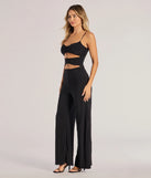 Step out in the Double Take Wide-Leg Cutout Jumpsuit, a black jumpsuit made to elevate your vibe from brunch to after-dark plans with ease and polish.
