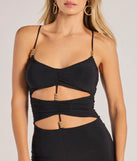 The Double Take Wide-Leg Cutout Jumpsuit, a women's black jumpsuit, is a chic one-piece outfit for parties and celebrations offering a glamorous look with festive style and on-trend design accents.