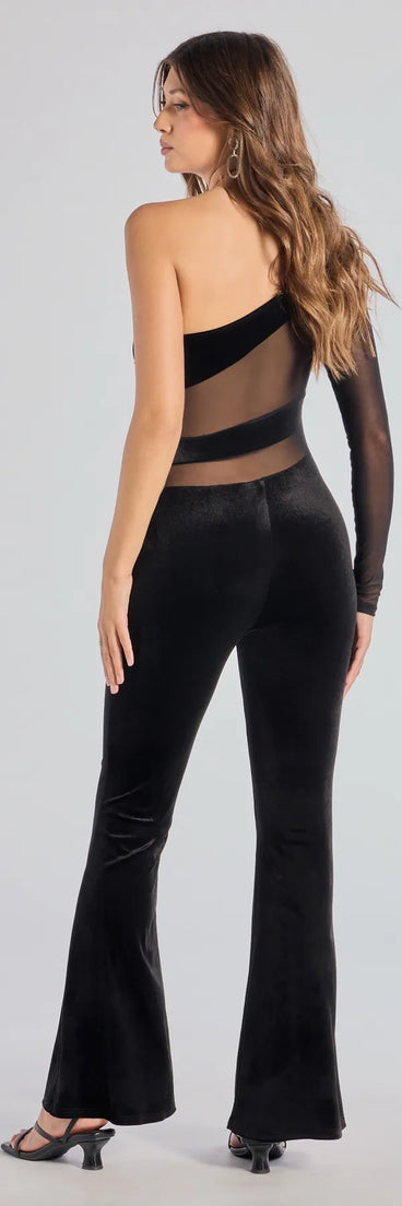 Create bold, fashion-forward looks for spring or summer with the Boldly Chic One-Shoulder Sheer Illusion Velvet Jumpsuit in black, a must-have piece from Windsor’s collection of stylish bottoms for women.