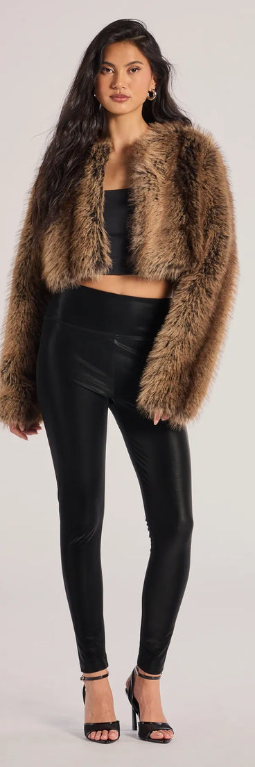 The Looking Sleek Faux Leather Leggings is a trendy women's bottom in black, designed with modern details and alluring textures to complete chic outfits for 2025.