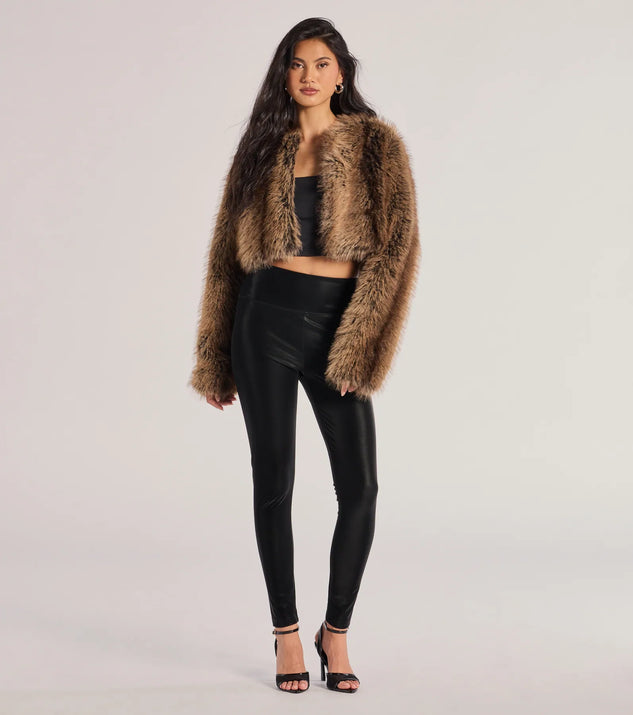 The Looking Sleek Faux Leather Leggings is a trendy women's bottom in black, designed with modern details and alluring textures to complete chic outfits for 2025.