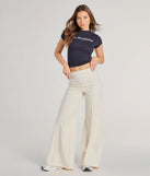 The Classic And Chic Wide-Leg Trouser Pants is a trendy women's bottom in ivory, designed with modern details and alluring textures to complete chic outfits for 2025.