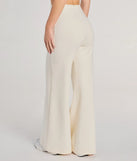 Create bold, fashion-forward looks for spring or summer with the Classic And Chic Wide-Leg Trouser Pants in ivory, a must-have piece from Windsor’s collection of stylish bottoms for women.